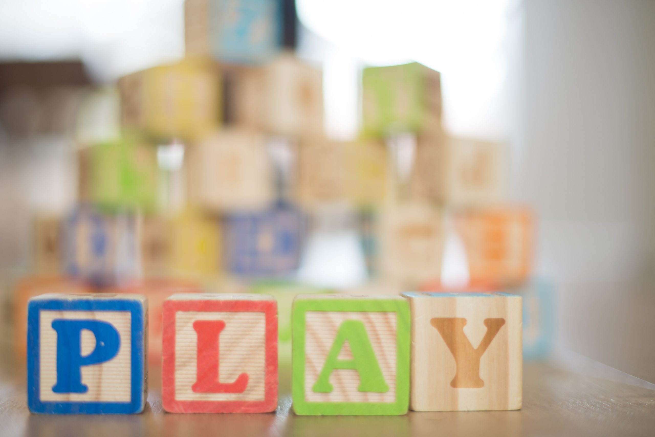 Children's blocks spelling out the word play